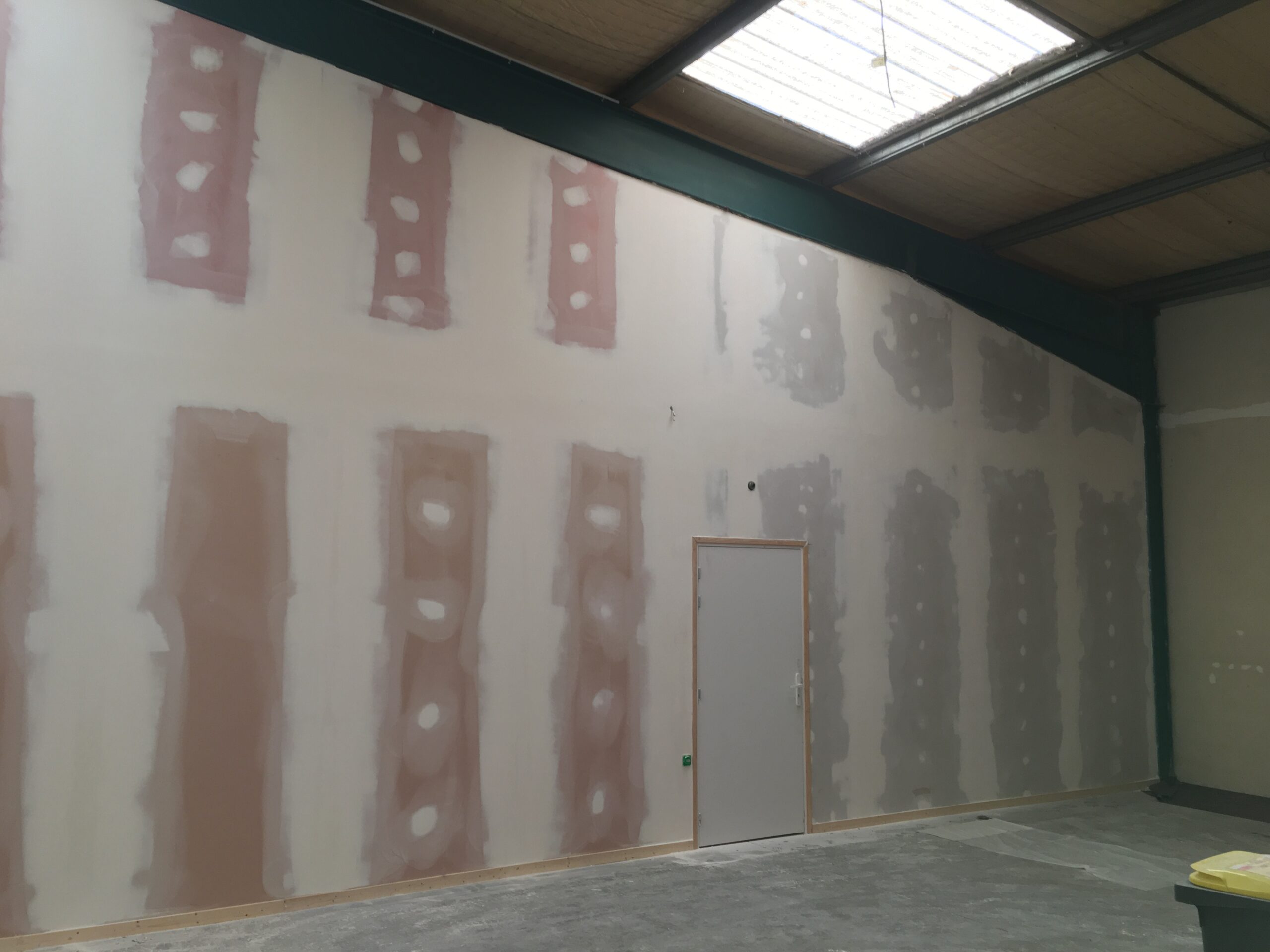 Rénovation L'orange Bleue. Salle de Sport. Mur en placo